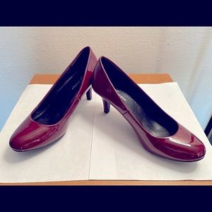 Burgundy patent pumps; perfect condition, never worn.